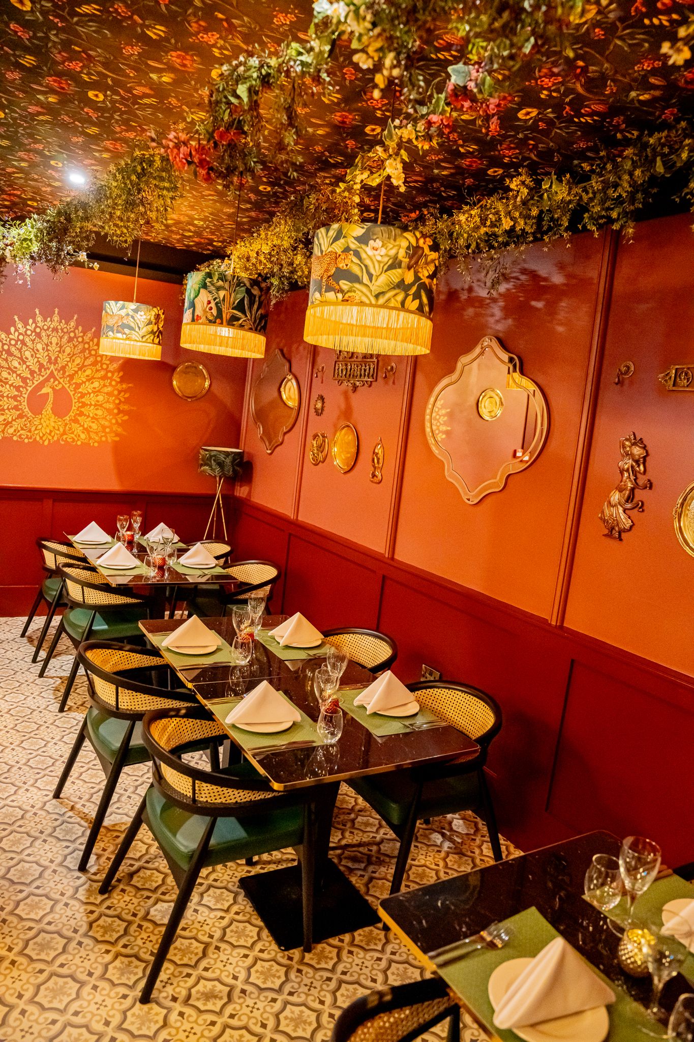 a restaurant with tables and chairs and a bar.